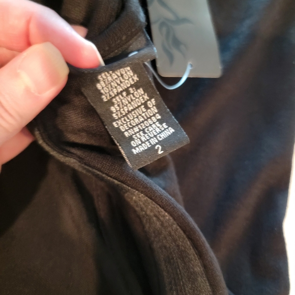 TORRID Mesh Inset & Faux Leather Peplum Top Size 2 - Picture 13 of 13